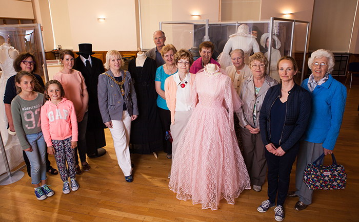 Causeway Coast and Glens Borough Councilâ€™s Coleraine Museum opened the â€˜Rites of Passageâ€™ exhibition in Coleraine Town Hall on Friday 17th July 2015. This fascinating new exhibition draws on memories and experiences shared by local people that everyone can relate and contribute to. Pictured at the exhibition is Mayor of Causeway Coast and Glens Borough Council, Councillor Michelle Knight-McQuillan with Museum staff, special guests and visitors. The exhibition is open from 17th July until 29th August, Tuesday to Saturday from 11am until 4pm at Coleraine Town Hall. For further information please contact Coleraine Museum Collections Access Officer, Sarah Carson on 028 7034 7234 or sarah.carson@causewaycoastandglens.gov.uk