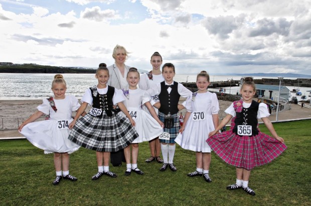 Pictured is Mayor of Causeway Coast and Glens Borough Council, Councillor Michelle Knight-McQuillan with competitors at the competition which was part of the weekend of events during the North West Pipe Band Championships, Portrush. 