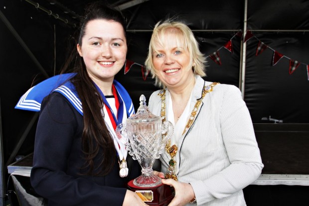 Pictured is Mayor of Causeway Coast and Glens Borough Council, Councillor Michelle Knight-McQuillan with prize winner at the competition which was part of the weekend of events during the North West Pipe Band Championships, Portrush. 