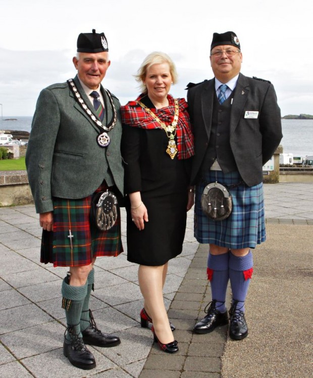 Pictured is Mayor of Causeway Coast and Glens Borough Council, Councillor Michelle Knight-McQuillan with President of the The Royal Scottish Pipe Band Association Northern Ireland branch, Winston Pinkerton and Chairman of the RSPBA NI, Ray Hall at the Mayorâ€™s Welcome Reception for the North West Pipe Band Championship.