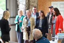 Finance Minister hearing about the plans for the former Meeting House in Bushmills, adjacent to the newly refurbished Courthouse