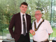 Outgoing Mayor of Causeway Coast and Glens Cllr McQuillan handing over to newly appointed Mayor Cllr Oliver McMullan.