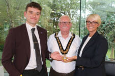 Outgoing Mayor of Causeway Coast and Glens Cllr McQuillan handing over to newly appointed Mayor Cllr Oliver McMullan, pictured with outgoing Deputy Mayor Cllr Tanya Stirling.