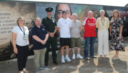 Mayor of Causeway Coast and Glens, Councillor Dawn Huggins with NIHE representatives, PSNI Neighbourhood officers, members of Dervock community association pictured with members of Council's Good Relation team.