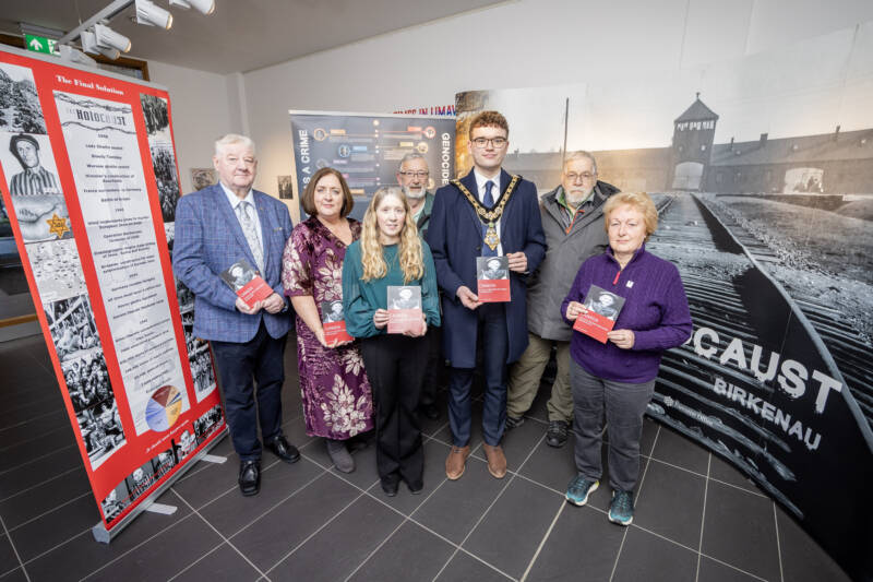 Mayor of Causeway Coast and Glens, Councillor Ciarán McQuillan pictured at the opening of the Holocaust Memorial exhibition in Roe Valley Arts & Cultural Centre. Included in the photo are Councillor Steven Callaghan, author of the Canada booklet, Joy Wisener, Good Relations Officer and Jamie Austin, Museum Officer alongside Hester McCunn, Robert Guthrie and Robert Peacocke from Binevenagh Historical Society.