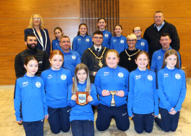 Causeway Coast and Glens Mayor Councillor Ciarán McQuillan and Deputy Mayor Councillor Tanya Stirling pictured with Mechelle Leeming and Alan McIntyre, Ballymoney United Youth Development Officers, and the Ballymoney Girls Youth Academy U13’s at a reception held to celebrate their recent success in local football.