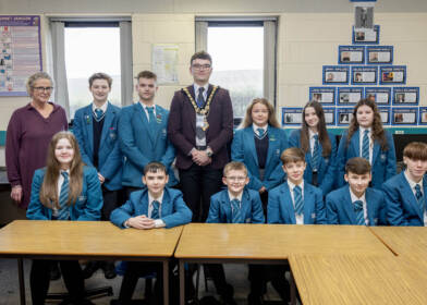 Mayor of Causeway Coast and Glens, Councillor Ciarán McQuillan pictured with North Coast Integrated College Principal Angela Passmore and Key Stage 4 students at ‘Breaktime with the Mayor’ part of the ‘Pupil Voice’ series held in the school.