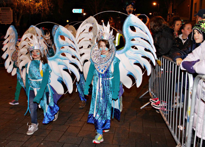 Striking characters warm the evening as the Christmas street parade makes its way to the Diamond for the Christmas Lights Switch On.