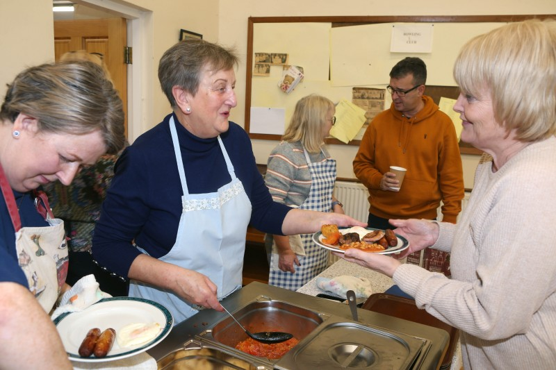 Local residents being served a delicious breakfast during the Mayor’s RNLI charity event in Christ Church Limavady.