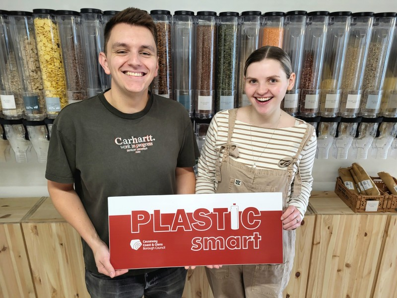 Marc and Emily Williamson of Considered Co Zero Waste and Refill Store, Coleraine, receiving their PlasticSmart award.