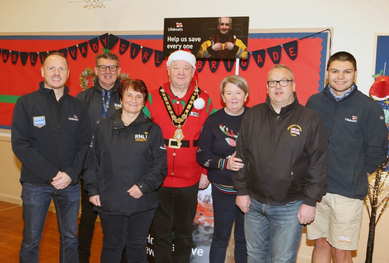 Mayor of Causeway Coast and Glens, Councillor Steven Callaghan with his wife Mayoress Ruth Callaghan the RNLI team.