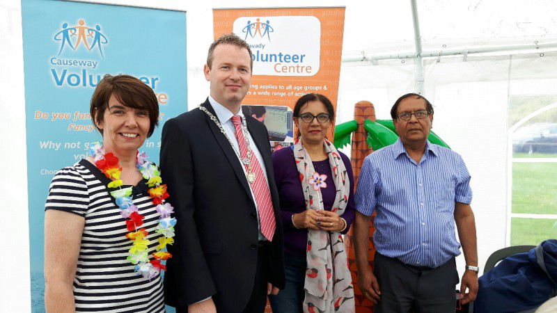 Mary McNickle, Causeway Volunteer Centre with James McCorkell, Deputy Mayor and the Asian over 50’s Club at the Portrush Volunteer event.