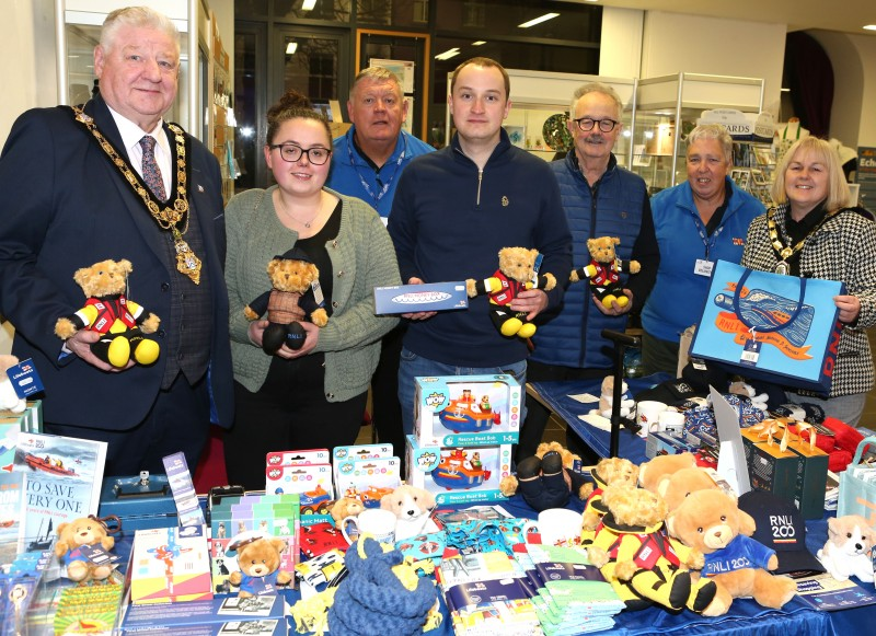 Mayor of Causeway Coast and Glens, Councillor Steven Callaghan, pictured with Deputy Mayor, Councillor Margaret-Anne McKillop the group are pictured at the RNLI shop set up in Roe Valley Arts Centre during February’s Gospel Concert in aid of the charity. The group are pictured holding RNLI products.
