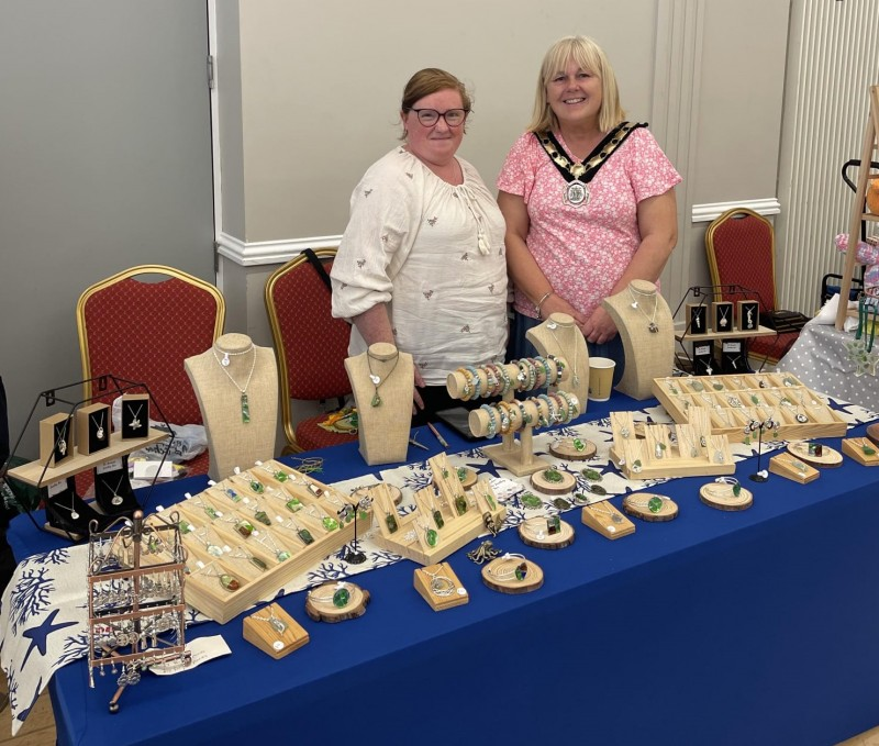 Deputy Mayor of Causeway Coast and Glens, Margaret Anne-McKillop alongside an artisan trader at her recent craft fundraiser.