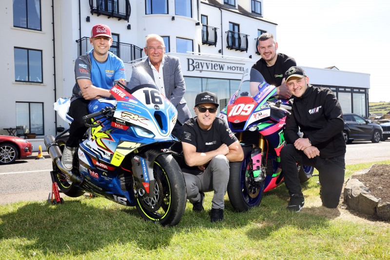 Trevor Kane, owner of the Bayview Hotel with road racers Dominic Herbertson, Jeremy McWilliams, Neil Kernohan and Ryan Whitehall.