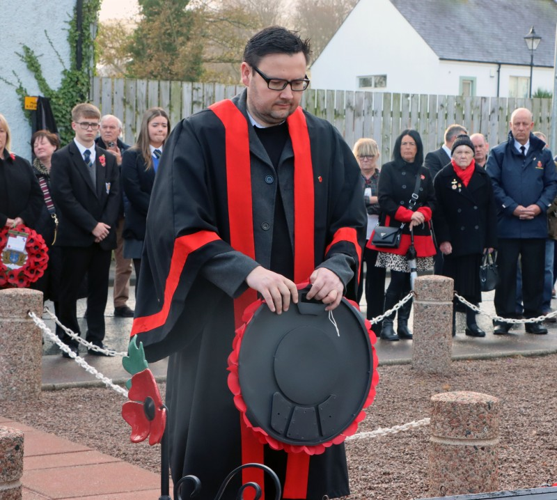 Councillor Lee Kane pictured laying a wreath at Ballycastle’s War Memorial.