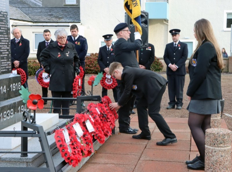 Local school children laying wreaths at Ballycastle’s War Memorial on Remembrance Day.