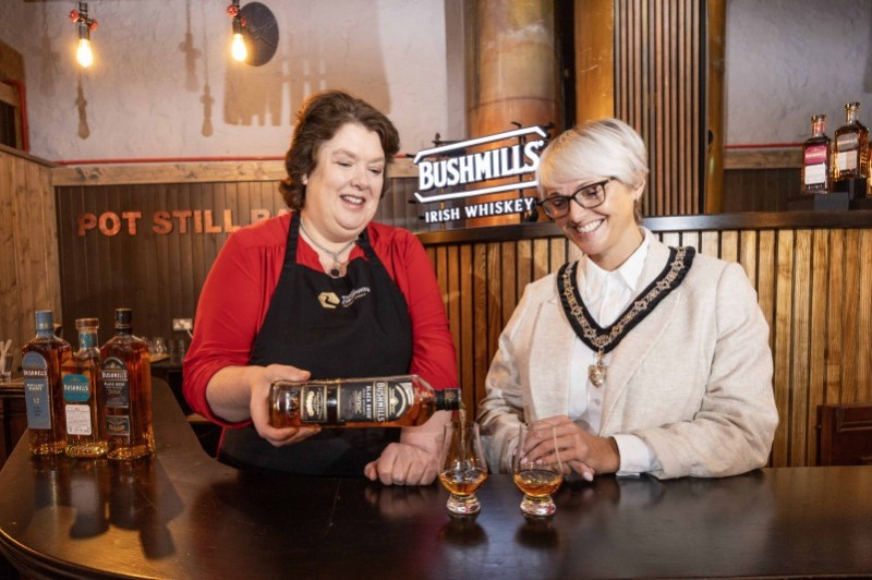 The 2024 Bushmills Salmon & Whiskey Festival makes its welcome return to the Borough from Friday 4th to Sunday 6th October, providing a not-to-be missed showcase that brings together local heritage and the best artisan produce the area has to offer. Causeway Coast and Glens Deputy Mayor, Councillor Tanya Stirling with local chef Paula McIntyre at the launch in the Old Bushmills Distillery.