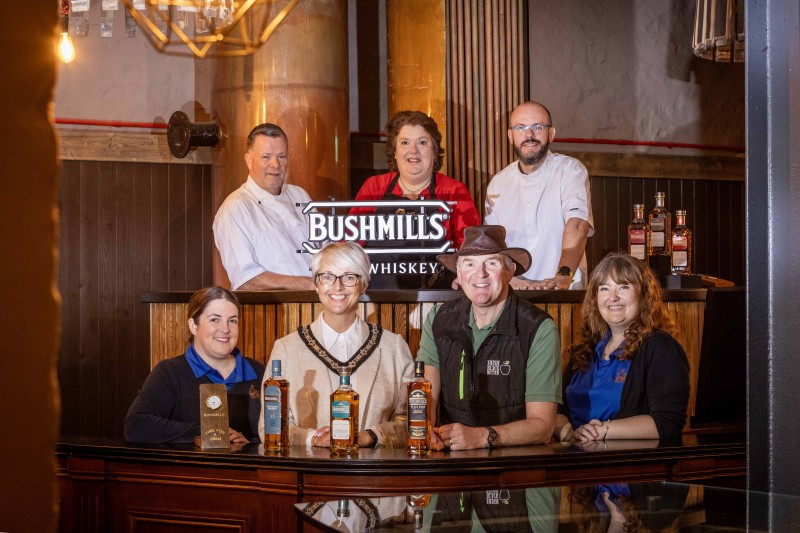 Causeway Coast and Glens Deputy Mayor, Councillor Tanya Stirling at the launch of the 2024 Bushmills Salmon and Whiskey Festival in the Old Bushmills Distillery with local chefs Gary Stewart, Tartine at The Distillers Arms, Ian Orr, Bushmills Townhouse and Paula McIntyre, Alastair Bell, Irish Black Butter and Laura Adams and Julie Dixon, Bushmills Distillery.