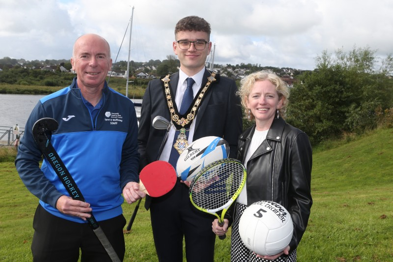 Mayor, Councillor Ciarán McQuillan launches the 2024 Causeway Coast and Glens Sports Awards alongside Stephen McCartney, Sports Development Manager and Pat Mulvenna, Director of Leisure and Development.