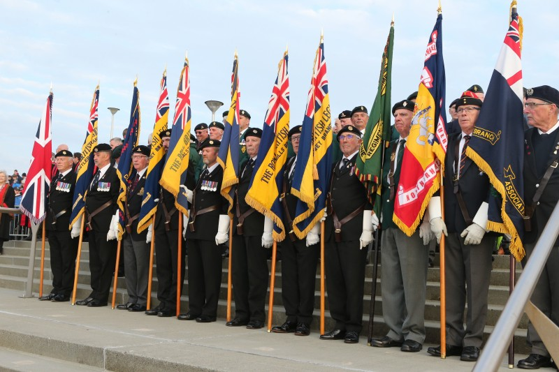 Standard bearers from the Royal British Legion, pictured at East Strand, Portrush for the D-Day beacon lighting to commemorate the 80th anniversary of D-Day.