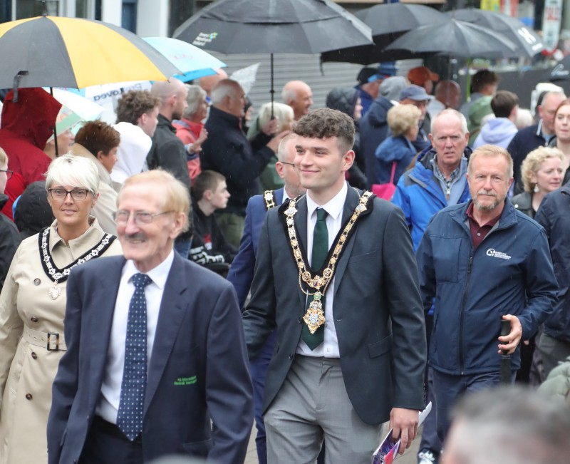 Mayor of Causeway Coast and Glens Councillor Ciarán McQuillan and Deputy Mayor Tanya Stirling pictured with Victor Leonard, SuperCupNI Chairman as the Welcoming Parade makes its way through the streets of Coleraine town centre.