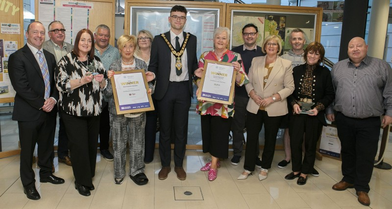 Mayor of Causeway Coast and Glens, Councillor Ciarán McQuillan, along with Winifred Mellet, staff with Overall Independent Retailer of the Year, Best Fashion Retailer and Winner of the High Street of the Year awards. Included are Peter McCool, Retail NI, Councillor Ivor Wallace, Geraldine Willis, Town & Village Management, Councillor Lee Kane and Councillor John McAuley.