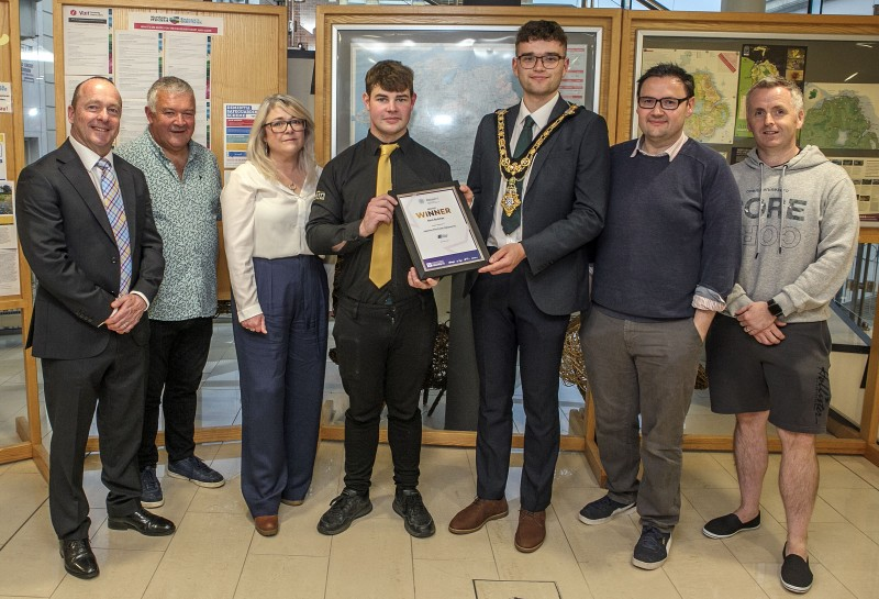 Mayor of Causeway Coast and Glens, Councillor Ciarán McQuillan, presents the Bronze Winner Award to Barry Apperley of Apperley Butchers, pictured with Peter McCool, Retail NI, Geraldine Willis, Town & Village Management and Councillors Ivor Wallace, Lee Kane and John McAuley.