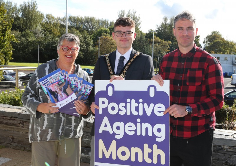 Mayor of Causeway Coast and Glens, Councillor Ciarán McQuillan, joins with Ann McNickle, Project Manager: Causeway Rural & Urban Network and Liam Hinphey, Age-Friendly Programme Coordinator, as the Mayor launches the programme of events for Positive Ageing Month this October.