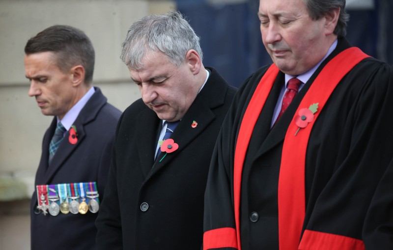 The Chief Executive of Causeway Coast and Glens Borough Council, David Jackson pictured at the Armistice Day service in Coleraine with Maurice Bradley MLA and Councillor David Harding.