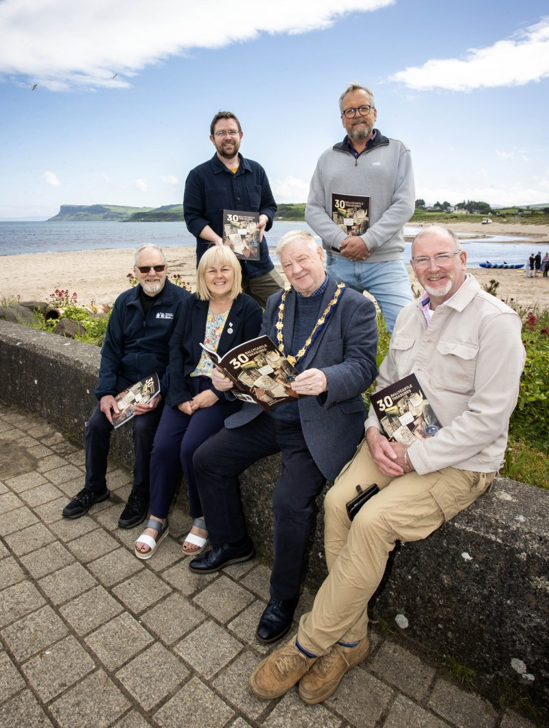 Pictured at the launch of the 30 Ballycastle Treasures book at Rathlin Sound Festival are the then Mayor, Cllr Steven Callaghan, the then Deputy Mayor Margaret-Anne McKillop, Council staff, and members of the Friends of Ballycastle Museum.