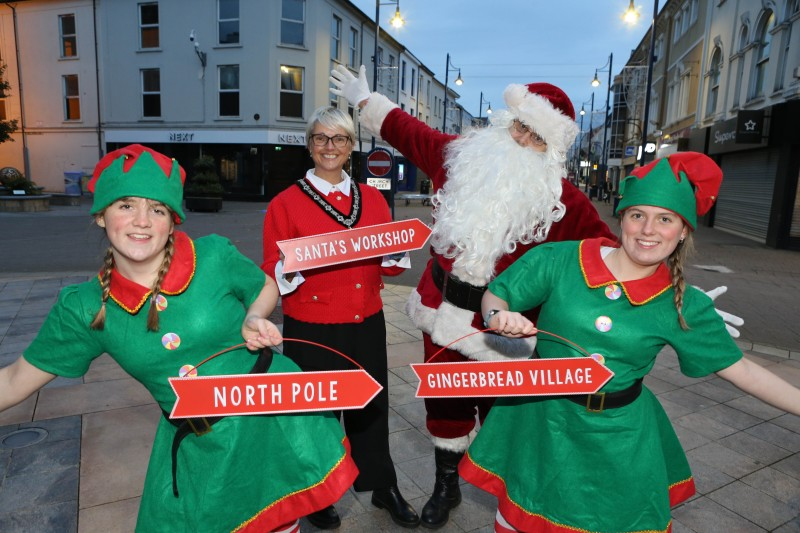 Causeway Coast and Glens Deputy Mayor, Councillor Tanya Stirling, pictured with Santa and his elves at the launch of the Christmas Light Switch On events in the Borough.