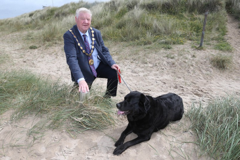 The Mayor of Causeway Coast and Glens Borough Council, Councillor Steven Callaghan with his dog Buster.
