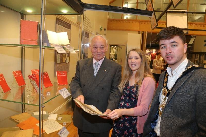 The Mayor of Causeway Coast and Glens Borough Council Councillor Sean Bateson pictured with Mac Pollock from Ballymoney Drama Festival and Jamie Austin, Museum Officer, Causeway Coast and Glens Borough Council at the George Shiels exhibition currently on display at Ballymoney Museum.