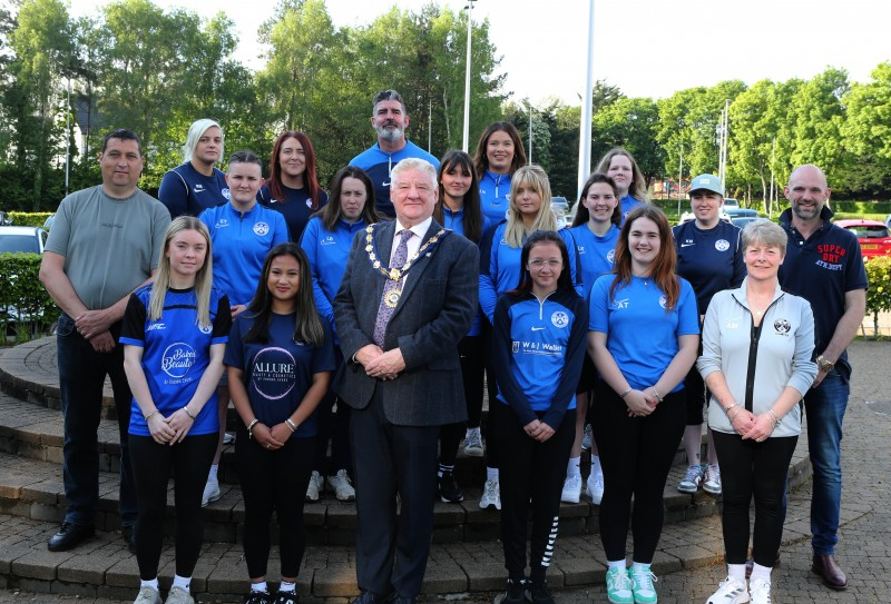 Mayor of Causeway Coast and Glens, Councillor Steven Callaghan pictured at Cloonavin with Ballymoney Ladies FC, alongside Councillor Jonathan McAuley and Councillor Allister Kyle.