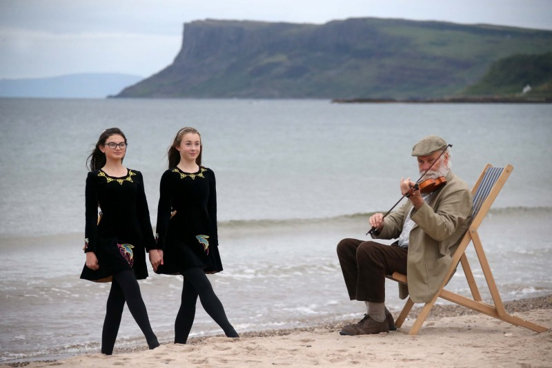 Ana and Alice from the Lir School of Irish Dancing who will perform on the seafront entertainment stage at this year’s Auld Lammas Fair put in some practice with help from musician Dick Glasgow.