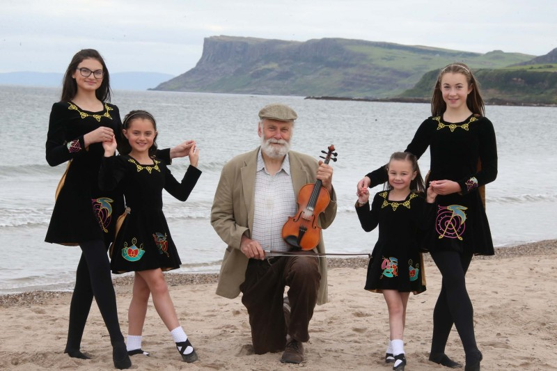 Ana, Eva, Alice and Roma pictured at Ballycastle seafront with musician Dick Glasgow ahead of this year’s Auld Lammas Fair in Ballycastle.