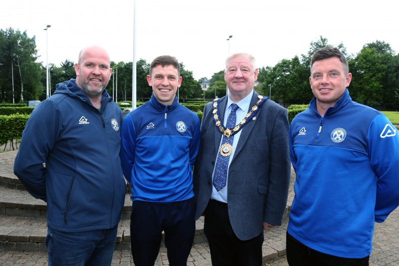 Limavady United Chairman Mark Clyde, with team captain Ruairi Boornan, manager Paul Owens and the Mayor of Causeway Coast and Glens, Councillor Steven Callaghan.