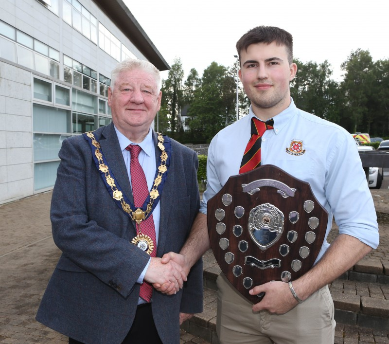 The Mayor, Councillor Steven Callaghan, with Limavady Rugby Club team captain Ben Riley.