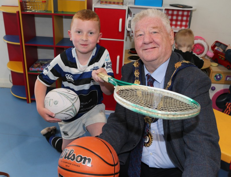 Ruairi McLaughlin with the Mayor, Councillor Steven Callaghan at the unveiling of the new multi-use games area at Magilligan Community Centre.