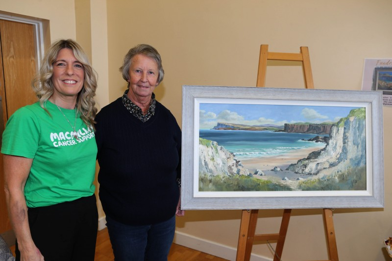 Catherine King, Council’s Macmillan Move More Coordinator, with local artist Heather Simpson, who very kindly donated a beautiful original painting for the coffee morning raffle.