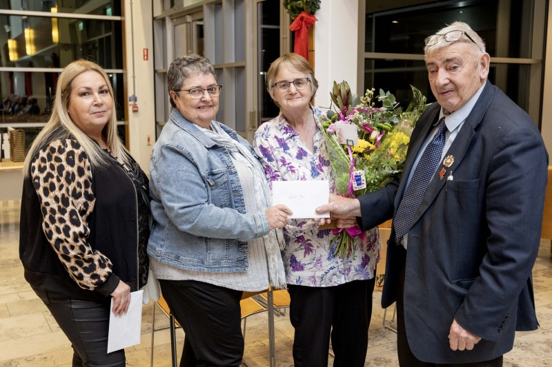 Mary Gibson, Chairperson and Patricia McQuillan MBE, Secretary of Moneydig Rural Network presenting Jean and Ian Henderson with flowers to acknowledge their work as volunteers in Moneydig Park, Garvagh.