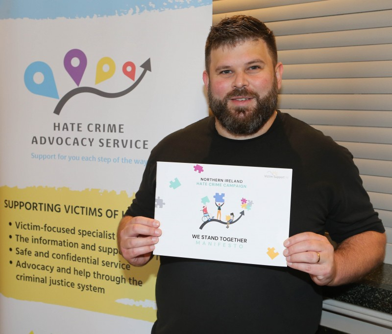 Michael Avila, Hate Crime Advocacy Service Manager, holding the ‘Hate Crime Manifesto’ at the launch of the new disability hate crime lesson plan.