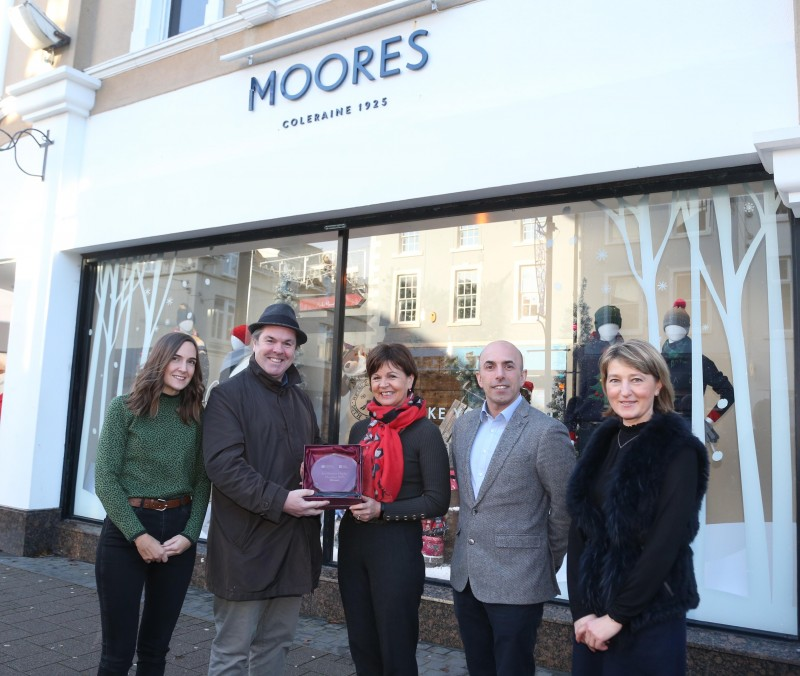 Moores on Church Street Coleraine was the winner of Causeway Coast and Glens Borough Council’s Christmas window competition in Coleraine. Pictured (L-R) are Layla Adams, SK, Lorna Gordon, Simon Colquhoun and Vera Duffy, receiving the award from Town and Village Officer Shaun Kennedy.