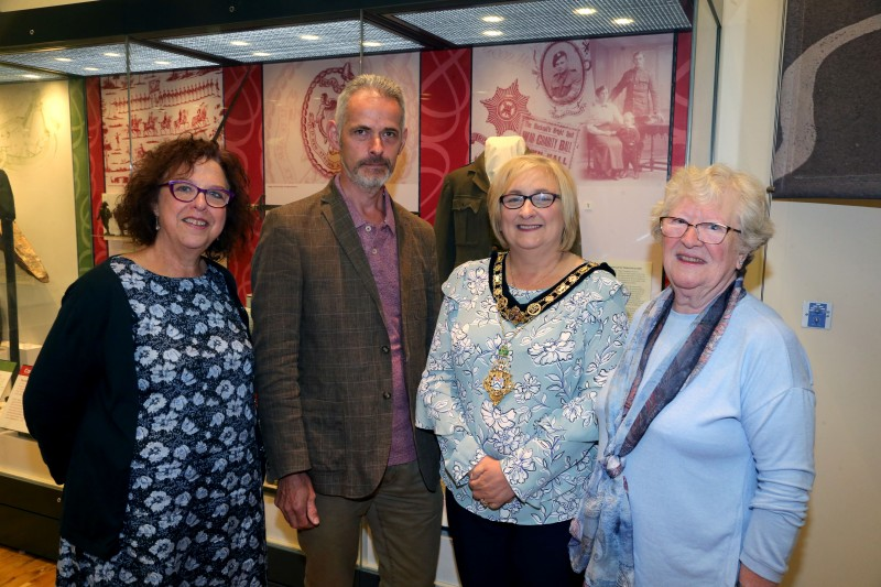 The Death Penny and Pond Farm Cemetery certificate are now on display in Ballymoney Museum after they were handed over by Andrew Barrett who found them in his uncle's house in Brookeborough. Andrew is pictured with Helen Perry, Causeway Coast and Glens Borough Council Museums Service, the Mayor of Causeway Coast and Glens Borough Council Councillor Brenda Chivers and Kathleen Connolly, local family history researcher