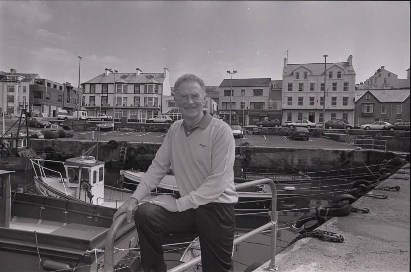 Footballing legend Harry Gregg whose life will be showcased in an upcoming exhibition in Coleraine Town Hall called “Harry Gregg: Dare to Dream.” Pictured standing at Portstewart Harbour.