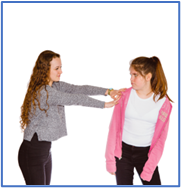 A young girl pushing another young girl's shoulder